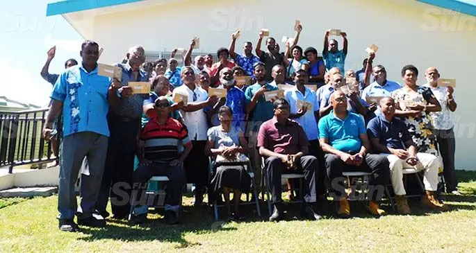 Ba farmers with the Minister for Agriculture, Environment and Waterways, Mahendra Reddy (front row, middle) after receiving their first tranche of the ‘Cash for Cultivation’ in Ba on March 17, 2021. Photo: Susana Hirst-Tuilau