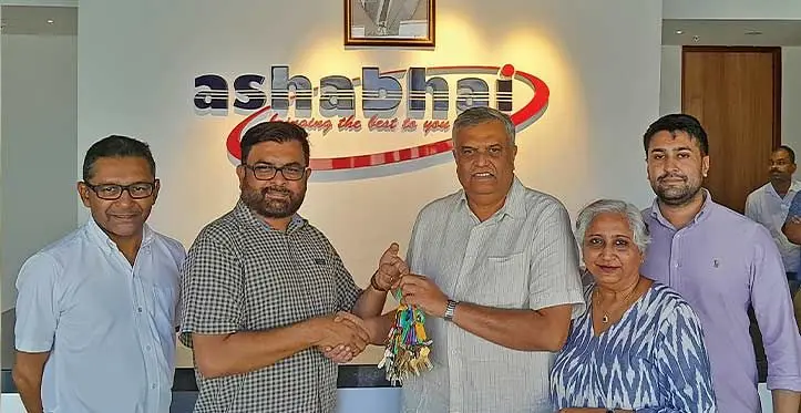 Design Hut architects Sanjay Patel, Jack’s Construction general manager Amrish Patel, hands over the key to Ashabhai Company Director Harish Patel, while Darshana Patel and Neil Patel looks on. Photo: Waisea Nasokia