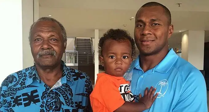 Paula Dranisinukula carries his son Anasa and is greeted by his dad Paula Dranisinukula Snr (left) at Nadi International Airport on March 13, 2019. Photo: Waisea Nasokia  a