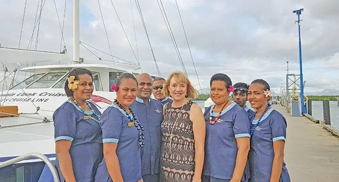Fourth from left:Jackie Charltion with the staff of Captain Cook Cruises at Port Denarau,Nadi.