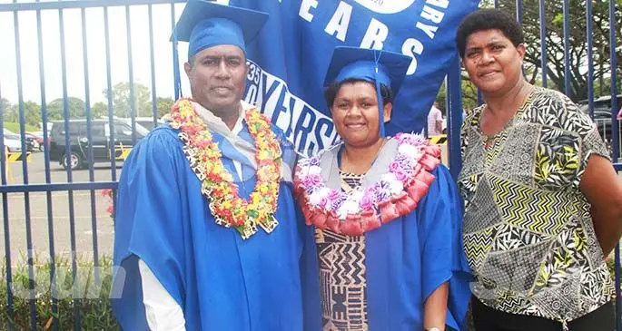 From left: Fiji National University graduate Paulo Kabulevu with a fellow graduate, Taraivini Liku, and sister Susana Kabulevu after the College of Business, Hospitality and Tourism Studies graduation on March 12, 2020. Photo: Shreeya Verma