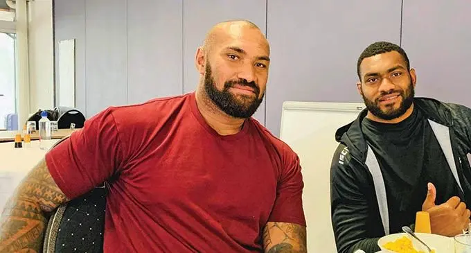Flying Fijians winger Nemani Nadolo (left) and Mesulame Kunavula tuck into a hearty meal in their camp base in France. They are playing against Georgia tomorrow morning. Photo: Autumn Nations Cup