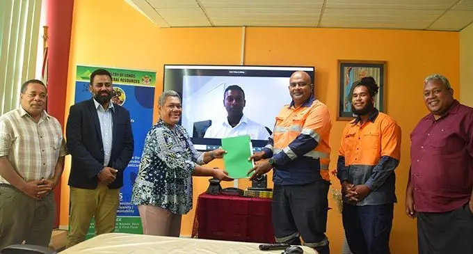 Director Mineral Resources, Raymond Mohammed (second from left), with Permanent Secretary for Lands, Raijeli Taga (third from left), following the signing of a memorandum of agreement with Maxbuild, over groundwater survey and development for the purpose of commercial mineral water bottling.