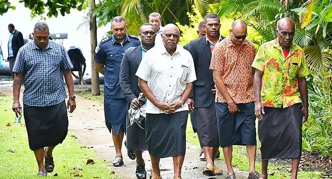 Opetaia Ravai (left), with Prime Minister Sitiveni Rabuka, officials and escorts while visiting Bau Island on December 31, 2022. The purpose of the visit was to present Mr Rabuka’s iSevusevu to the paramount chief of Bau and head of the Kubuna Confederacy, NaTuraga Bale na Tui Kaba, and Vunivalu, Ratu Epenisa Cakobau. Photo: DEPTFO News