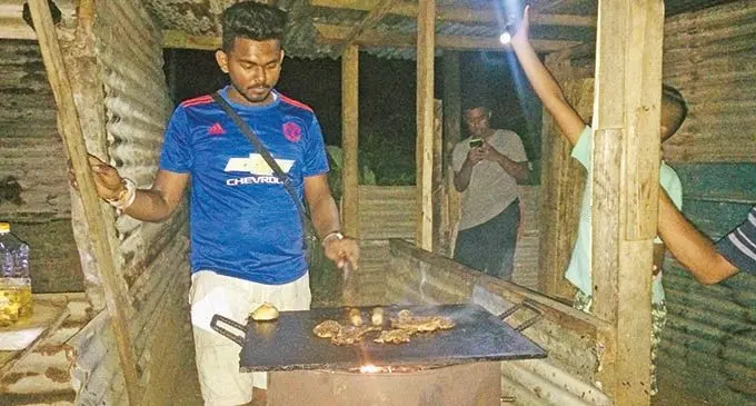 Nikil Chand sells barbeque at night at his stall. Photo: Sheenal Charan  