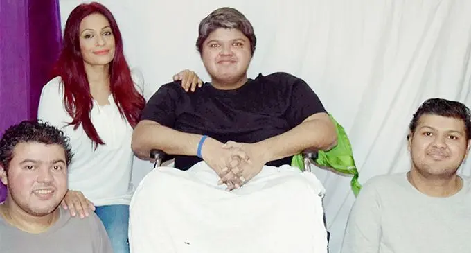 Sabrina Khan with disabled brothers Rajneel( left), Raveen on wheelchair and Arvin Kumar.