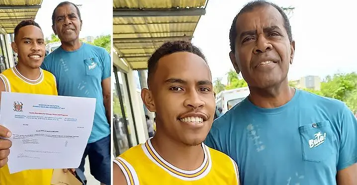 Timoci Serevi of Beqa Yanuca Secondary School with his father, Luke Serevi after collecting his year 12 exam result from Ministry of Education results centre in Suva on January 31, 2023. Photo: Ronald Kumar