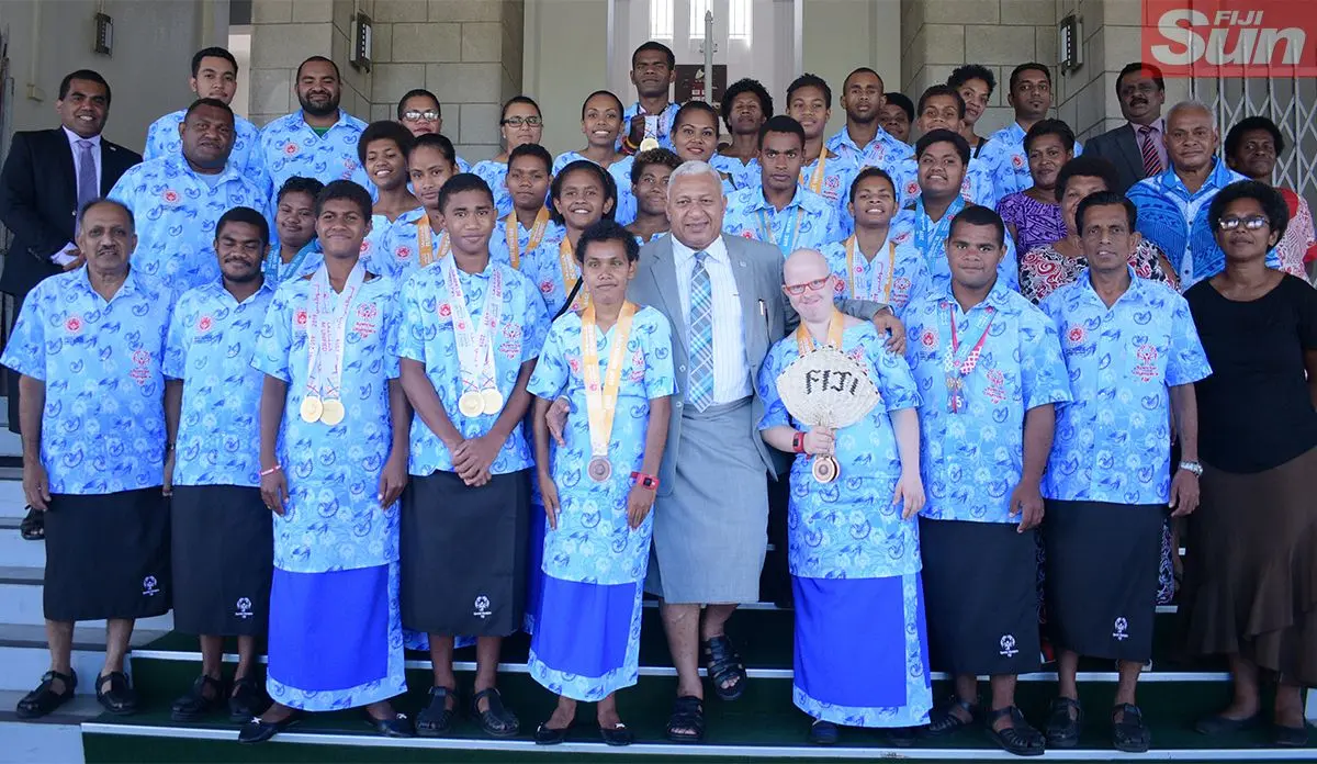 Prime Minister Voreqe Bainimarama , Minister for Youth and Sports Praveen Bala and Assistant Minister for Youth and Sports Alipate Nagata with Fiji Special Olympic athletes, coaches and parents with their medals in Parliament on April 1, 2019. Photo: Ronald Kumar.