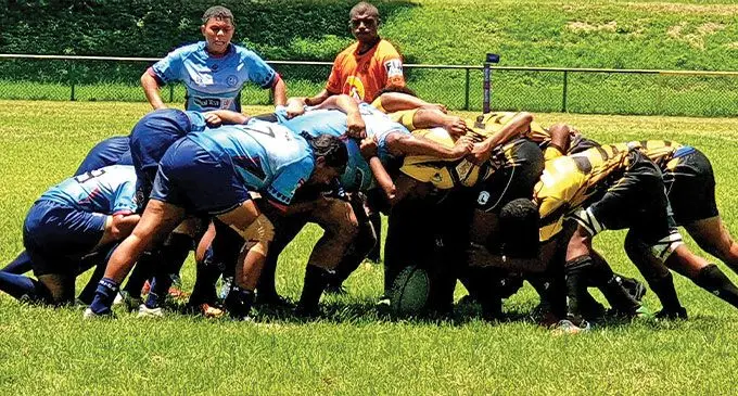 Vatukoula women’s rugby team (yellow) clashes with Tavua in the scrum during their Royal Tea Ranadi clash at Garvey Park, Tavua, early this year. Both teams have qualified for the Ranadi Cup quarterfinals. Photo: Tavua Rugby