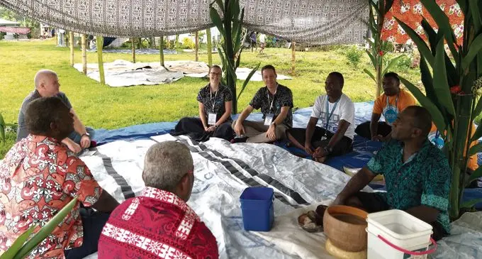 Multinational Observer Group observers speaking with community leaders in Burelevu in Ra province.