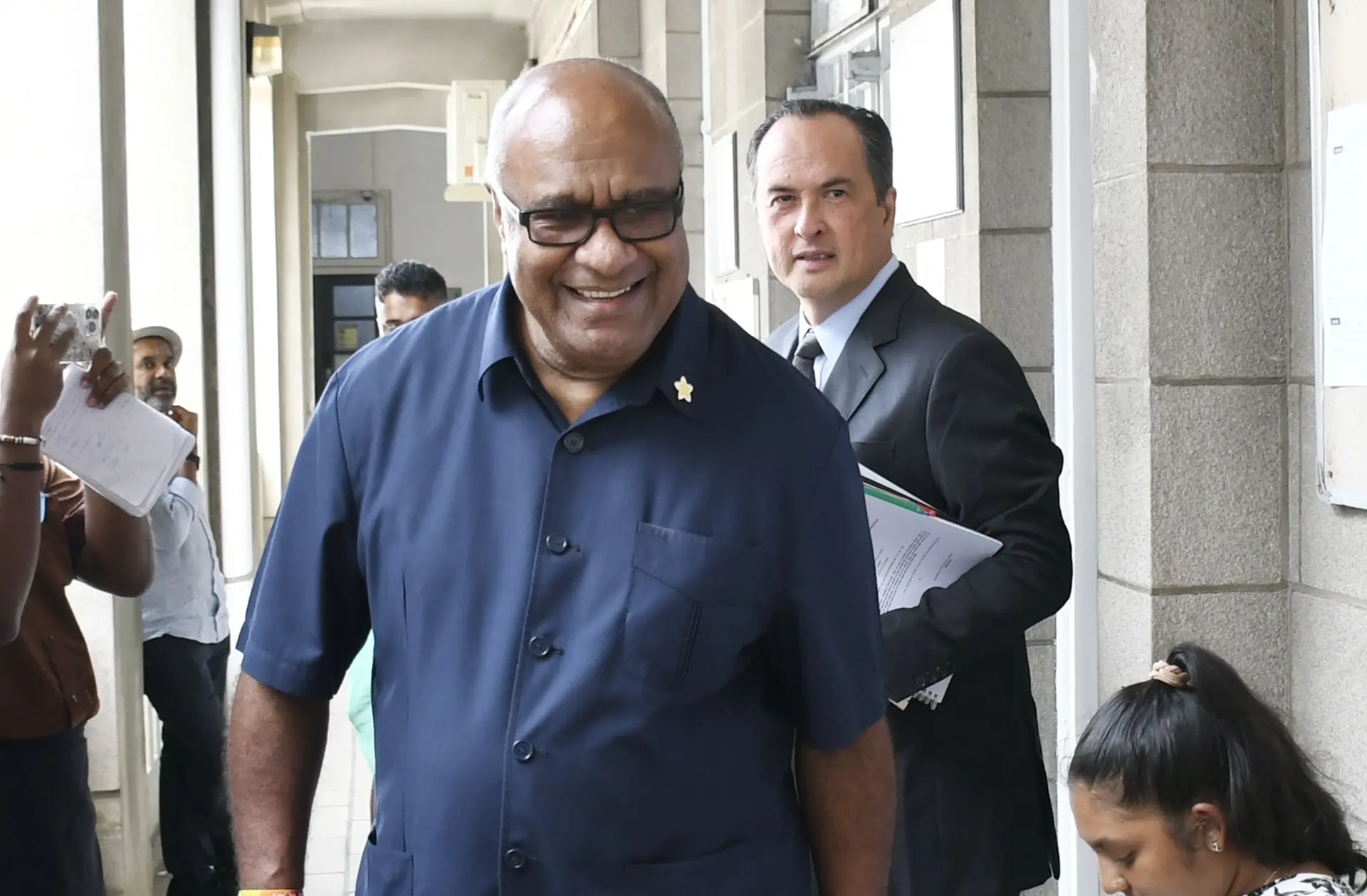 Former Deputy Prime Minister and Minister for Trade Manoa Kamikamica with lawyer Wylie Clarke outside the Suva Magistrate Court on October 24, 2025.
