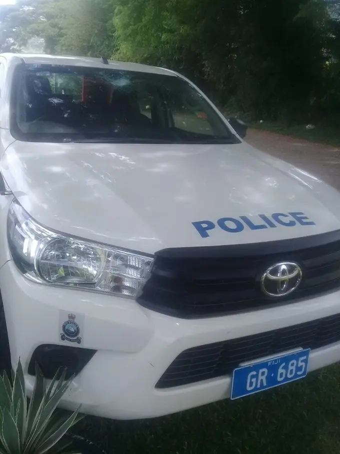 The Police vehicle that was stoned in the West.