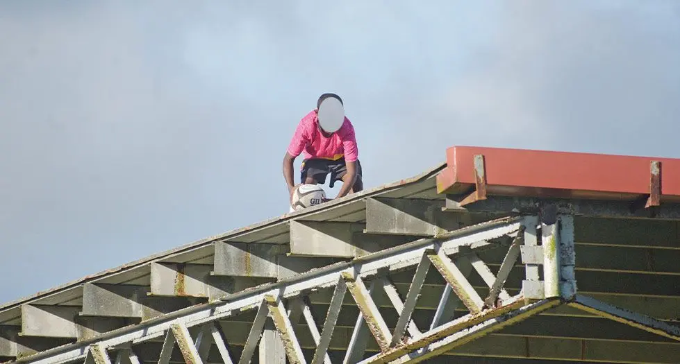 The ball boy seen on the roof the pavilion of the closed off Ratu Cakobau Park. Photo: Ronald Kumar