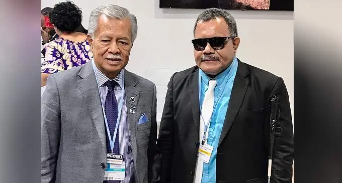 Pacific Disability Forum Chief Executive Officer Setareki Macanawai with Pacific Islands Forum Secretary-General Henry Puna after a side event at the Moana Blue Pacific Pavilion at the COP27 venue in Sharm El-Sheikh, Egypt on November 15, 2022.