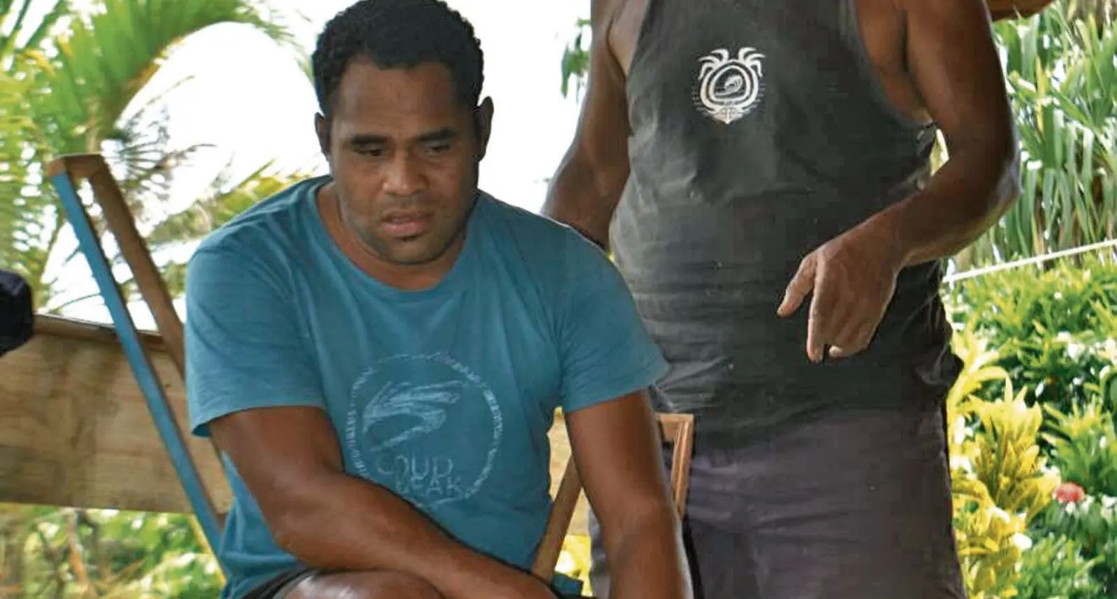 Samuela Valekuta with his son Aborosio Rokete who was injured during the search at his home in Dogoru Village on February 28, 2018.  Photo: Wati Talebula