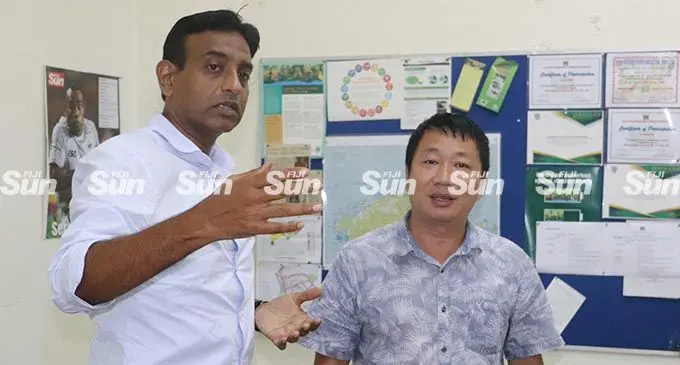 Joshua Wycliffe (left) responds to queries by Gold Hold Investments Sawmill owner, Richard Du, during the Environment Impact Assessment (EIA) clinic in Labasa on February 8, 2022.  Photo: Sampras Anand