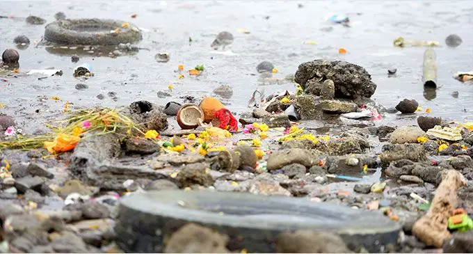 Idols were seen to be washed ashore in Laucala Bay, Suva on November 14, 2023. Inset: Tonia Serevatu, 16 with the idols he found. Photo: Ronald Kumar