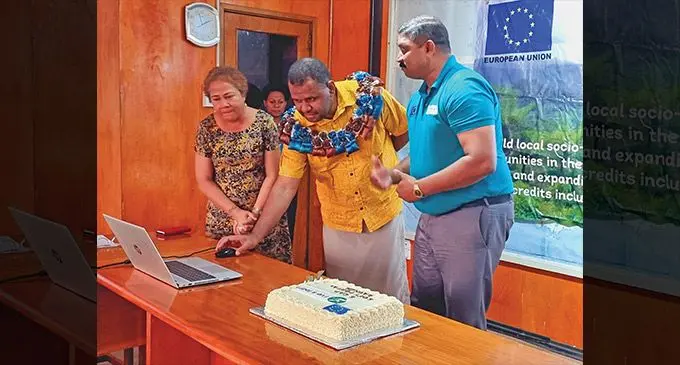 Non-Government organisation, Live and Learn Environmental Education Fiji, country manager, Doris Susau (left), and Ecosystems-based Climate Adaptation Project (ECAP) (right), Subesh Prasad shows Divisional Planning Officer, Setareki Dakuiboca (middle) the new portal and its operation during its launch in Labasa on September 8, 2022. Photo: Sampras Anand
