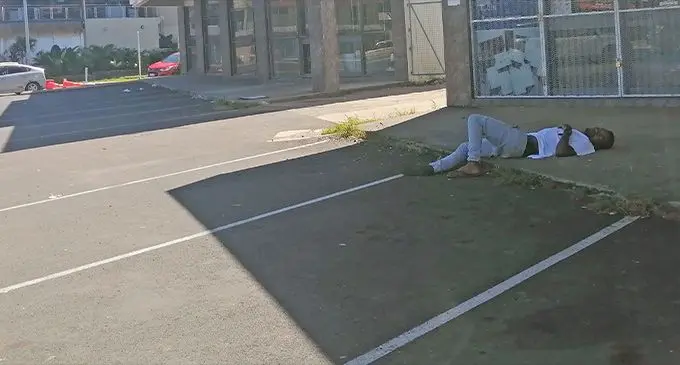 Drunkard at a shop corridor in Martintar.