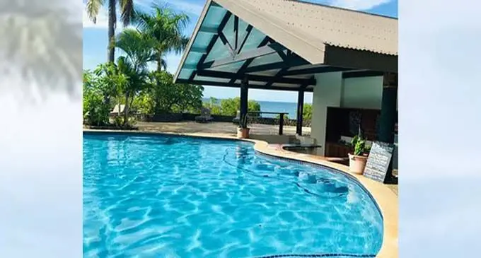 Cool off in the pool bar at Volivoli Beach Resort. Inset: Volivoli Beach Resort’s sales and marketing manager , Simon Doughty.