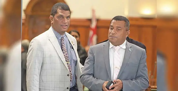 Minister for Education Aseri Radrodro, (left), with the Minister for Housing Maciu Katamotu in Parliament on April 5, 2023. Photo: Ronald Kumar