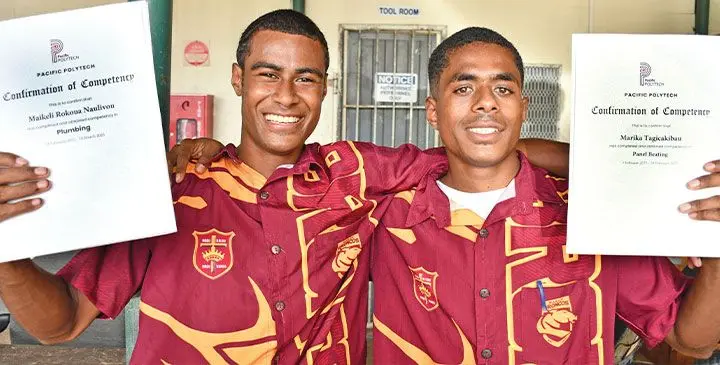 Once a street kid battling drug addiction, Marika Tagicakibau (right), 20, graduated with a certificate in panel beating from Pacific Polytech. After five years on the streets, his life turned around through faith and support from youth group Team Gideon. "It was all God's plan," he said. On the left is plumbing graduate Maikeli Naulivou. Photo: Ronald Kumar