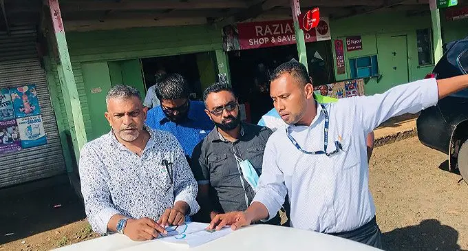 Minister for Commerce, Trade, Tourism and Transport, Faiyaz Koya, (left) during a tour of Savusavu