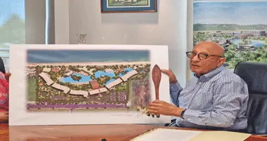 Hari Punja & Sons Limited chairman Hari Punja with an artist’s impression of the new hotel. Photo: Laiseana Nasiga