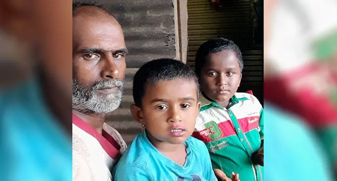 Shyam Murti with his children Chiraag Murti (on the lap) and Chahal Murti on Taveuni.