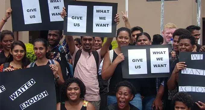 University of Fiji students with their placards during the protest. Photo: Rohit Kumar 