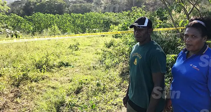 Marisilino Radrugale and Raijieli Musu at the scene of the Police Investigations.  Photo: Waisea Nasokia