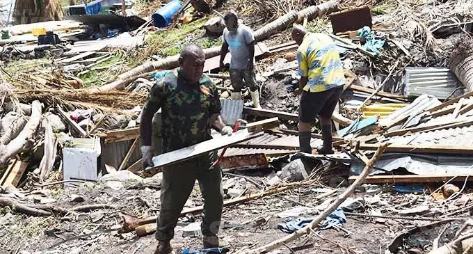 Republic of Fiji Military Forces personnel are on the ground on Kia Island helping villagers clear away debris left behind by Cyclone Yasa. Photo: Laisa Lui