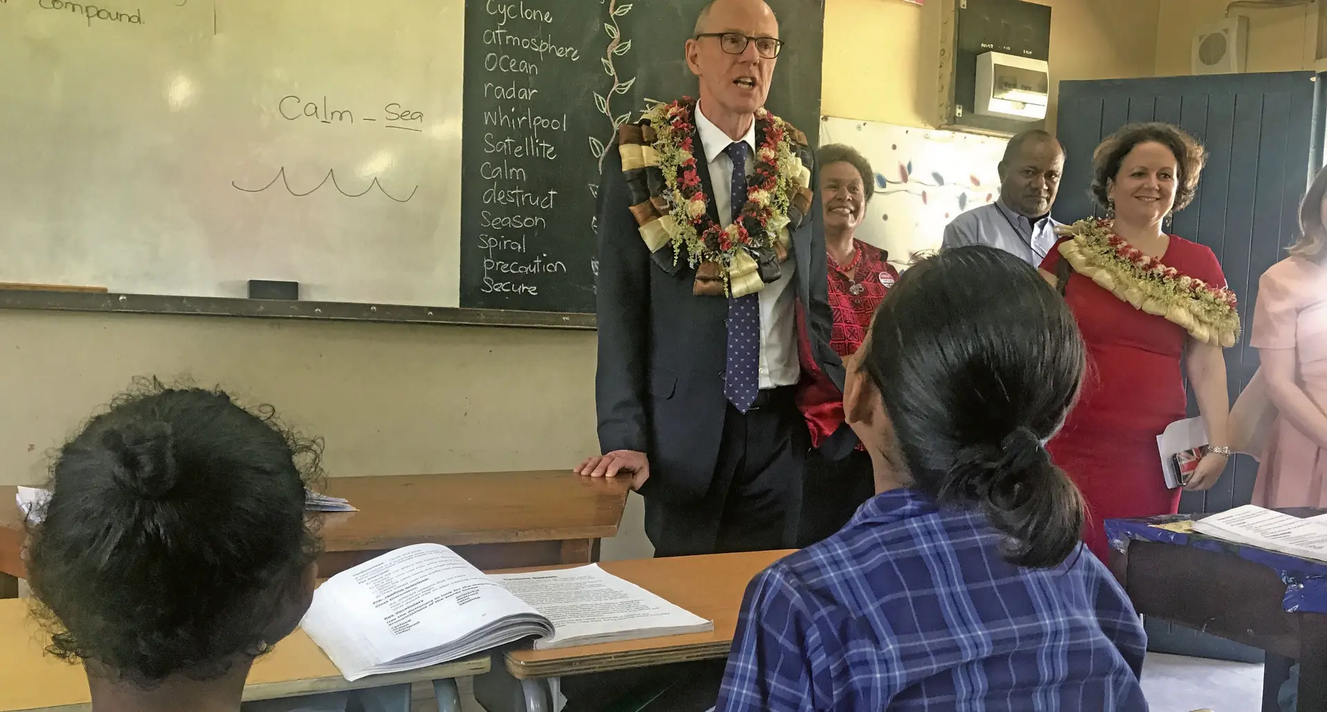 The United Kingdom Minister of State at the Department for Education, Nick Gibb (wearing black suit) with British High Commissioner, Melanie Hopkins (right) speaks to students of Nadi Airport School in Namaka, Nadi on February 20, 2018. Photo: Arieta Vakasukawaqa