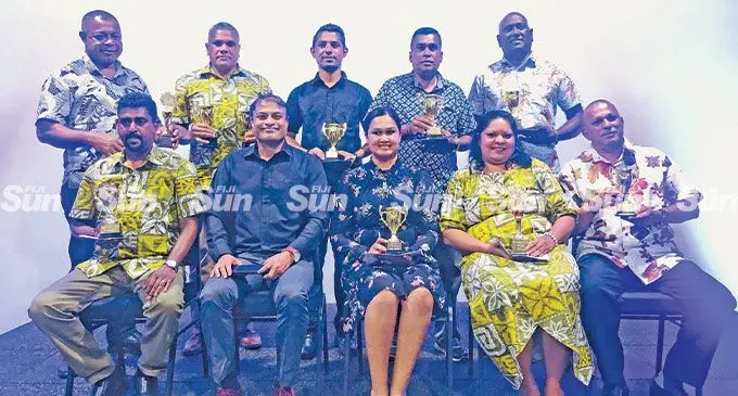 Post Fiji chief executive officer, Anirudha Bansod (seated second from left) with the award recipients on June 9, 2022. Standing, second from left: Nadi Airport Post Office manager international mail exchange, Jope Vukice. Photo: Shreeya Verma.