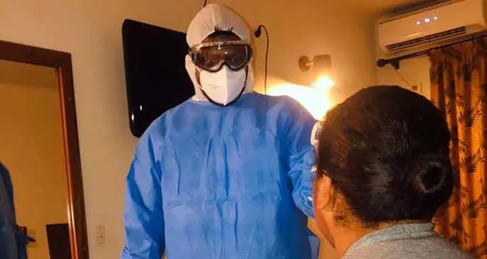 One of the Ministry of Health workers at a residence delivering door-to-door screening. Photo: Ministry of Health