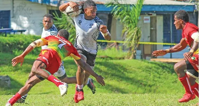 LAR Barbarians winger, Manueli Maisamoa tries to break through the Uluninakau defence during the Mobil Super 7s Series at ANZ Stadium, Suva on November 13, 2021. Photo: Pita Simpson
