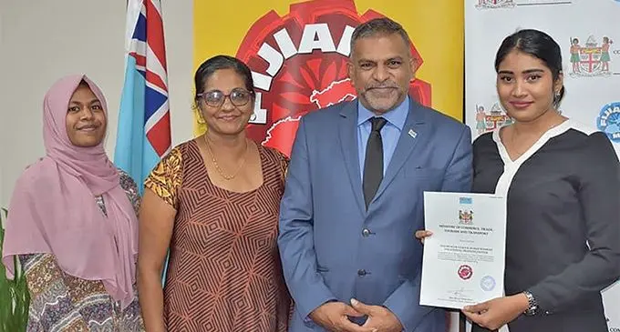 Minister for Commerce, Trade, Tourism and Transport, Faiyaz Koya (third from left) congratulating the Makoi Women’s Vocational Training Centre for renewing their Fijian Sewn license under the Fijian Made - Buy Fijian Campaign