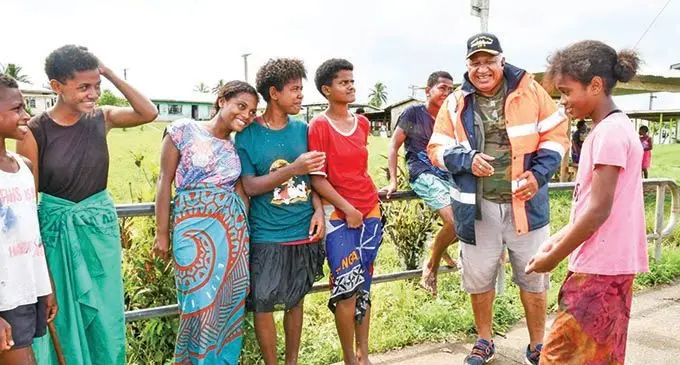 The Prime Minister Voreqe Bainimarama with children in Naqali, Tailevu on February 1, 2021.   Photo: Office of the Prime Minister