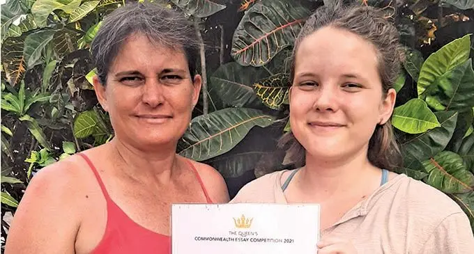 Monica Pattie and her daughter Katie Pattie hold up her Queen’s Commonwealth Essay Competition Gold award certificate at their home in Saweni,Lautoka on October 18,2021.