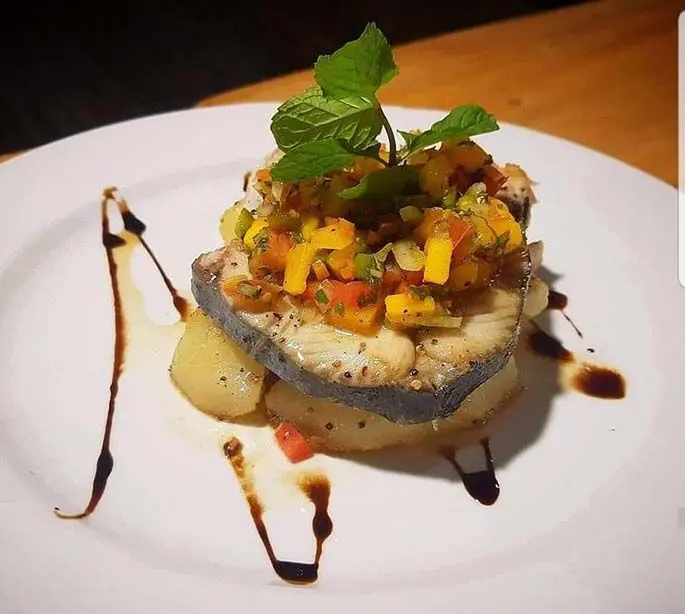 Fresh Walu Steak with fresh mango salsa served at Golden Point Resort.