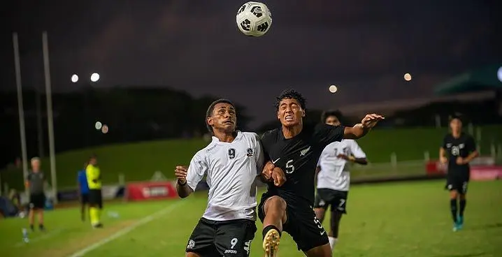 Junior Bula Boys striker Salimone Ravonokula contests for possession against a New Zealand player during their Oceania Football Confederation (OFC) Under-17 championship semifinal match at the HFC bank Stadium on January 25, 2023. Photo: Leon Lord.