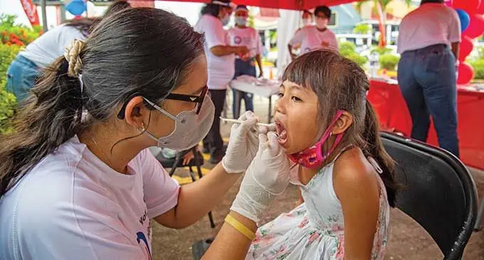 Student dentist Natasha Singh checks six-year-old Rosanna Yuen during the free dental check at Damodar City, Laucala Bay on March 20, 2021. Photo: Leon Lord