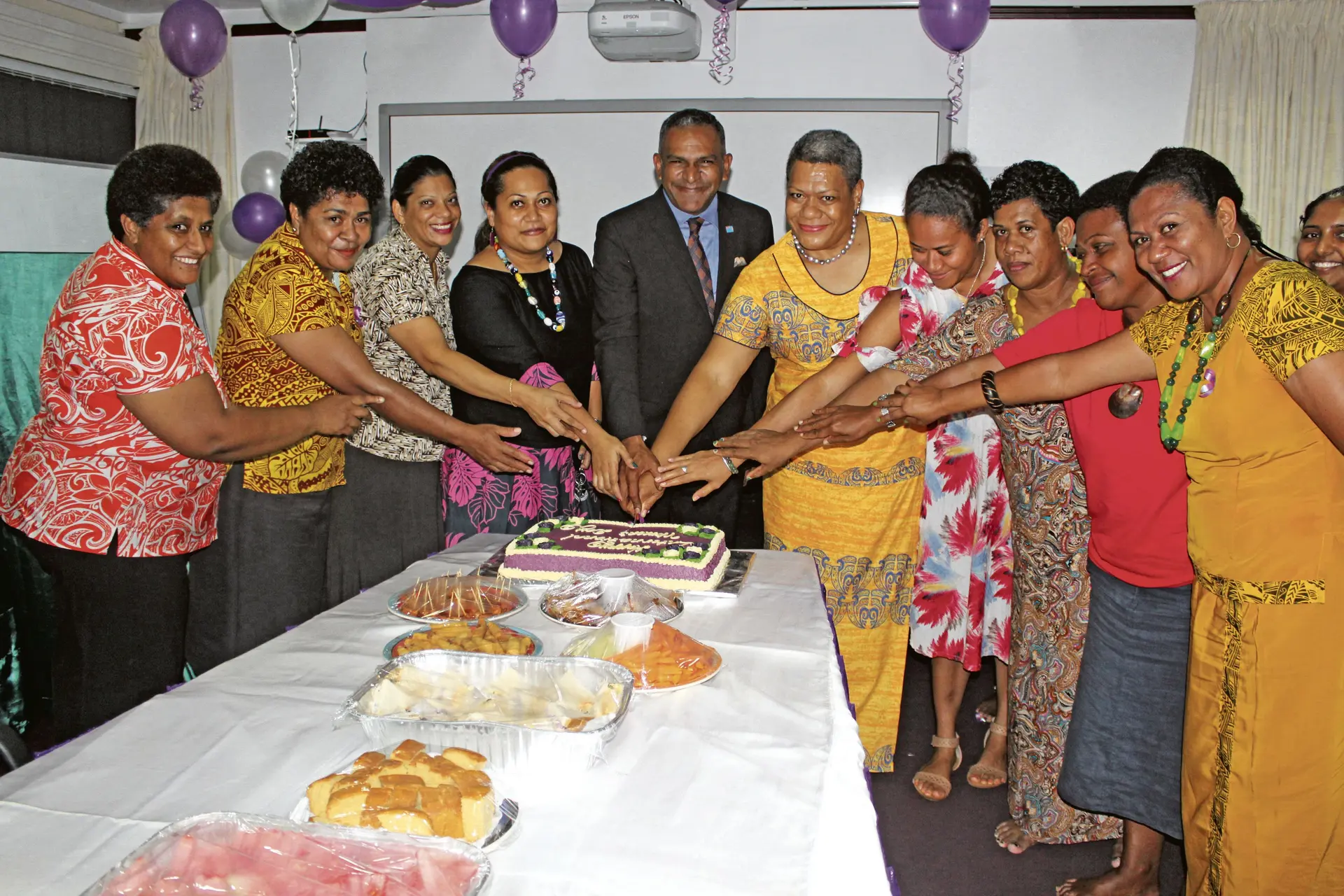 Minister for Lands and Mineral Resources Faiyaz Koya with ladies from the Ministry of Land and Mineral Reaources during the  International Womens Day Celebrations on the 9th of March, 2018.Photo: Simione Haravanua.