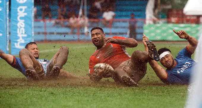 Tonga and Worcester Warriors centre Cccoper Vuna slides in to score a try against Samoa in their 2019 Pacific Nations Cup opener at Apia Park on July 27, 2019. Samoa won 25-17.  Photo: World Rugby