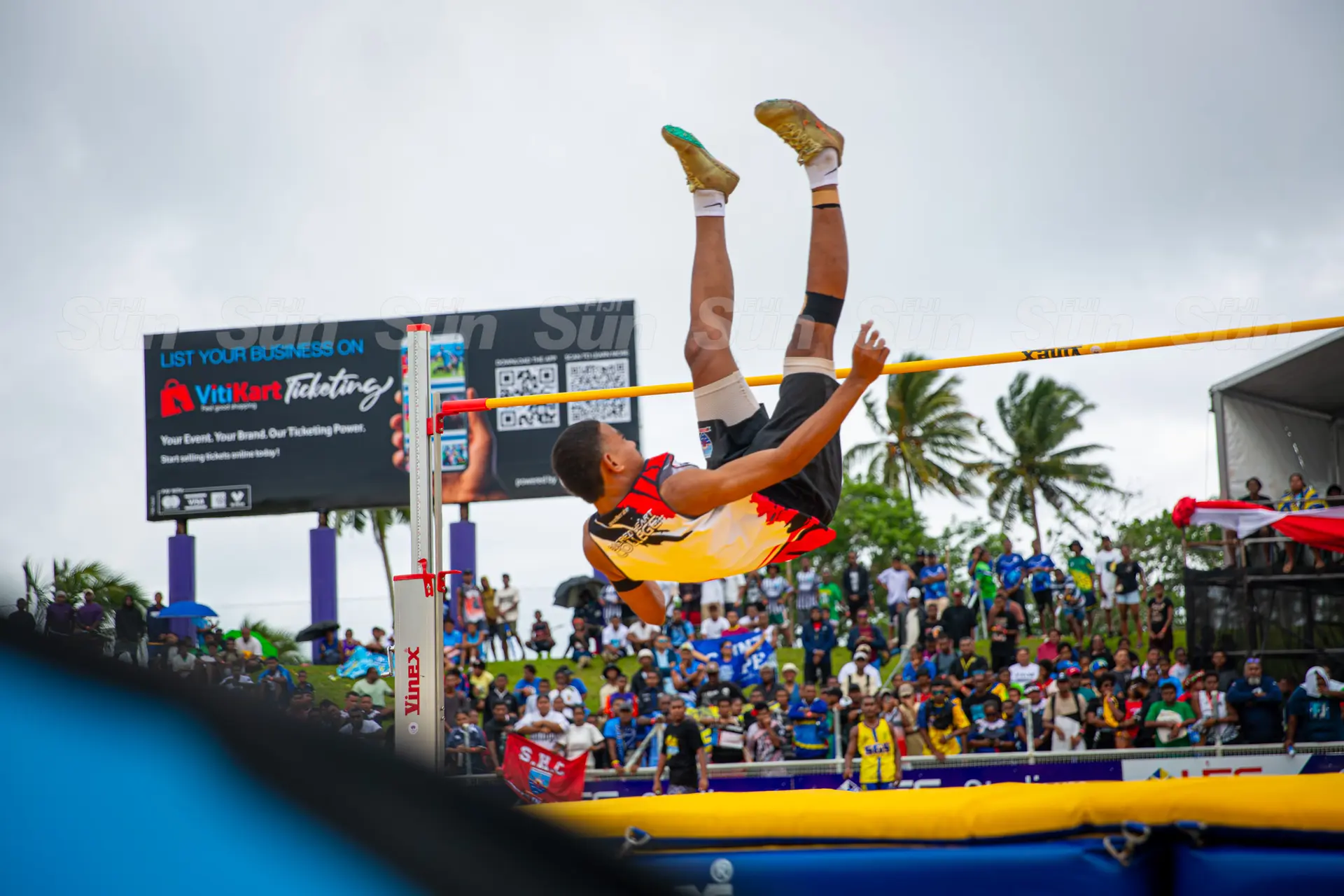 Peter Burese of Sacred Heart College soars to a new Senior Boys High Jump record, clearing an impressive 2.10m at the Coca-Cola Games.