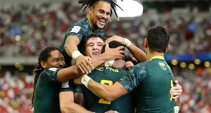 South Africa on top of the world after beating Fiji at the Singapore 7's 20 - 19.