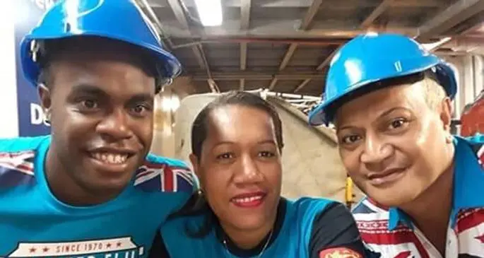 Sokimi Kautane (right) with his colleagues Onisimo Votea (left) and Melaia Mamare (middle).