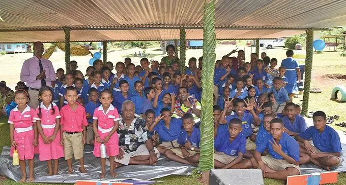 Minister for Lands and Mineral Resources, Filimoni Vosarogo, with school representatives, guests and students during the commissioning of the Coboi Primary School borehole at Lekutu, Bua, on April 12, 2023.