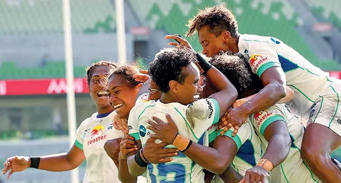Rooster Chicken Fijiana Drua players celebrate their title victory after beating Waratahs in the Super W final. Photo: Super W