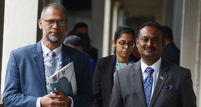 Fiji Financial Intelligence Unit Director Razim Buksh (left) with Parliamentary Standing Committee on Economic Affairs Chairperson Vijay Nath on September 18, 2019. Photo: Ronald Kumar. 